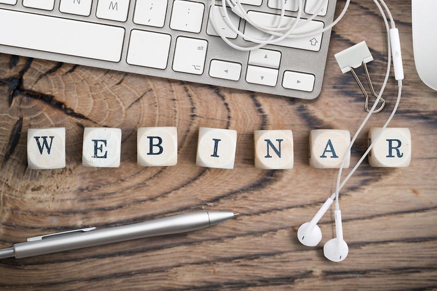 cubes with word "webinar" on wooden background